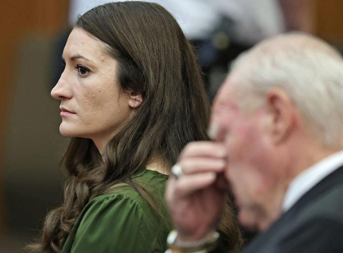 Lindsay Clancy watches jury members as Judge William Sullivan polls them in Plymouth Superior Court in Plymouth, Massachusetts,