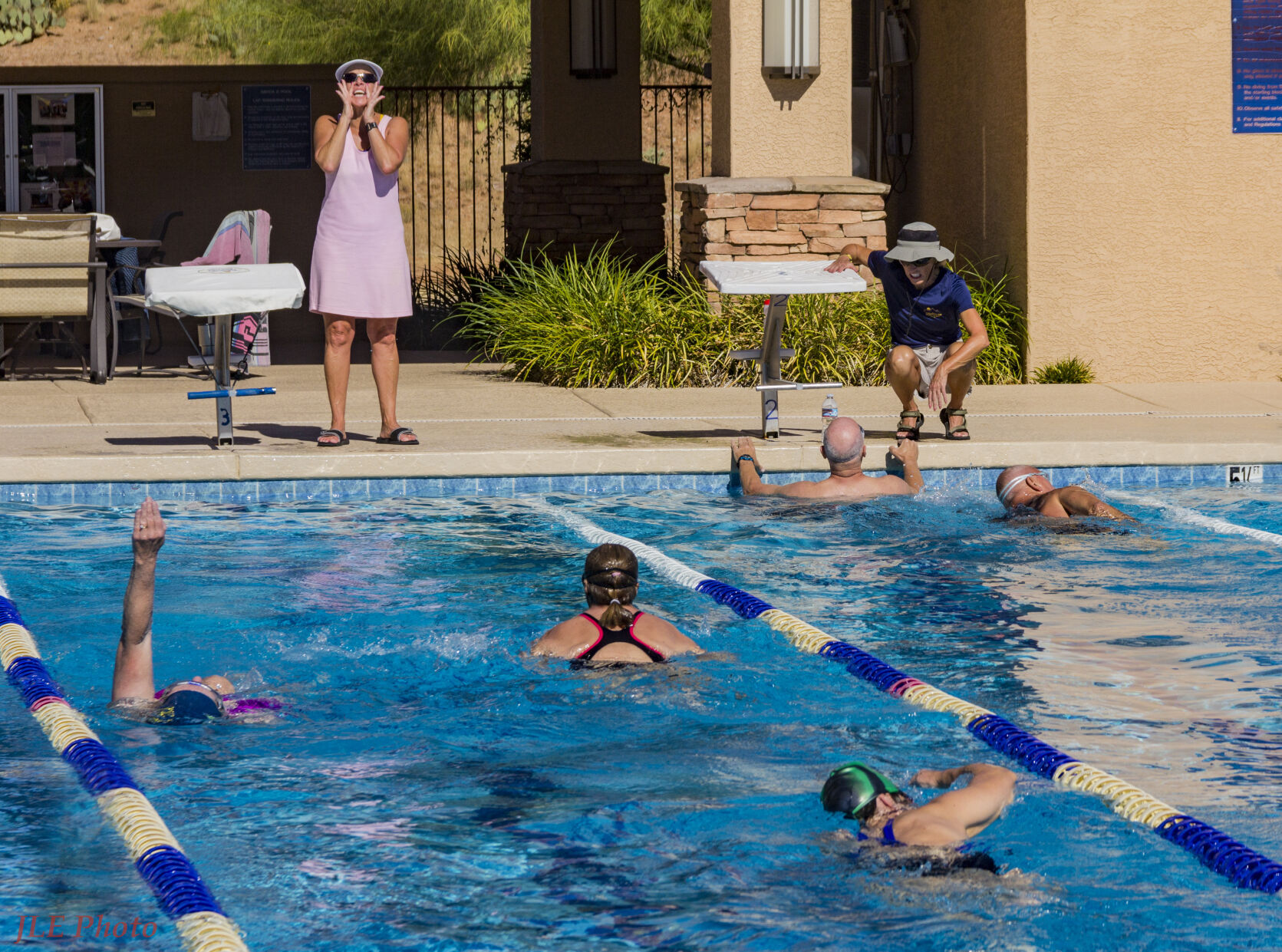 Allison-Lehman-and-Joyce-Howard-giving-indvdual-attention-to-Let-s-Swim-Participants.jpg