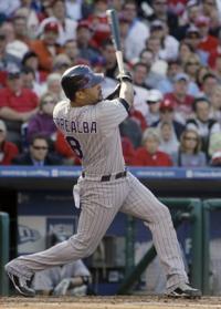 Iannetta, Olivo will share catching duties, Tracy says   