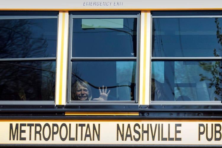 Child in bus window