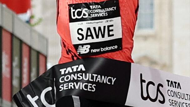 Kenya’s Sawe shatters two-hour marathon barrier