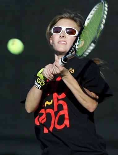 TENNIS PLAYERS HIT THE COURTS   