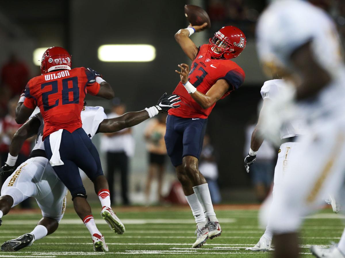 Arizona Wildcats QB Brandon Dawkins is learning on the job ...