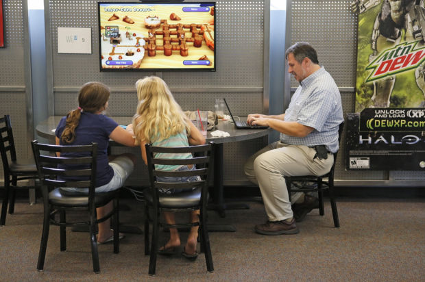 Pac-Man meets pepperoni at game-play pizza shop    