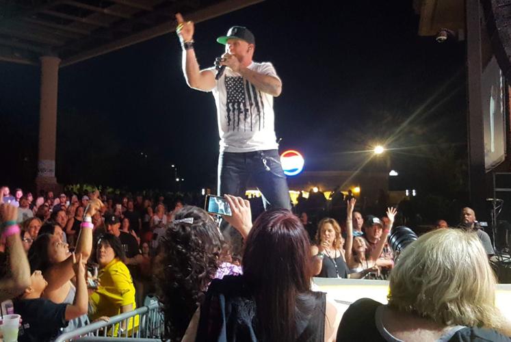 Chains, tats and whole lotta heart: Brantley Gilbert brings ...