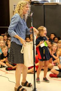 First-grader's donation to help homeless gets her belled