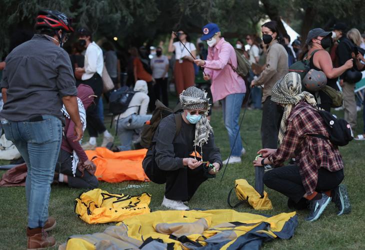 Pro-Palestinian protesters defy U of A rules, put up tents; police gather