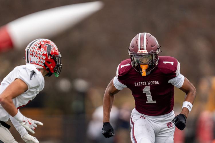 Harper Woods wide receiver Dakota Guerrant (1) runs a route during a Division 4 regional final against Divine Child High School at John Glenn High School in Westland on Saturday, Nov. 15, 2025.