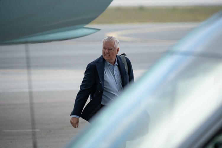 Lindsey Graham (R-SC) arrives at Palm Beach International Airport