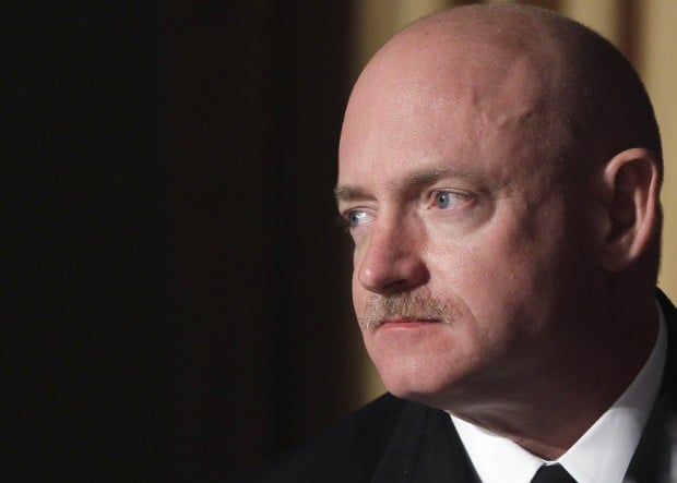 Giffords' husband sees improvement   