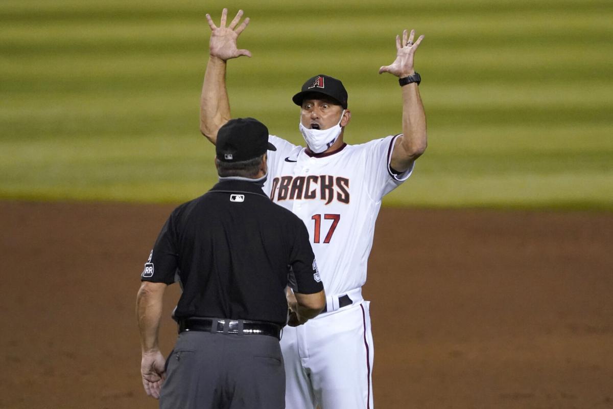 Late surge helps Rockies beat D-backs, end skid