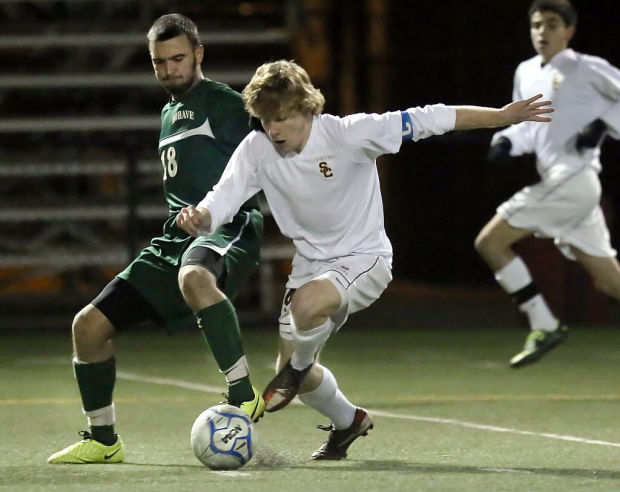High school boys soccer: 'Working like a machine,' Lancers move on    