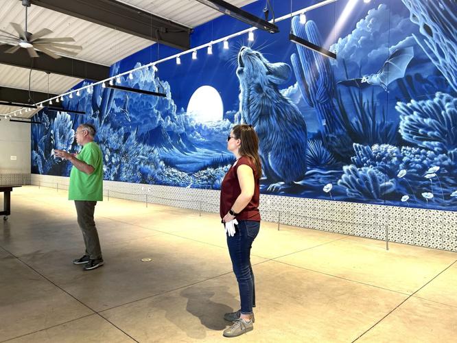 curators-and-mural.jpeg