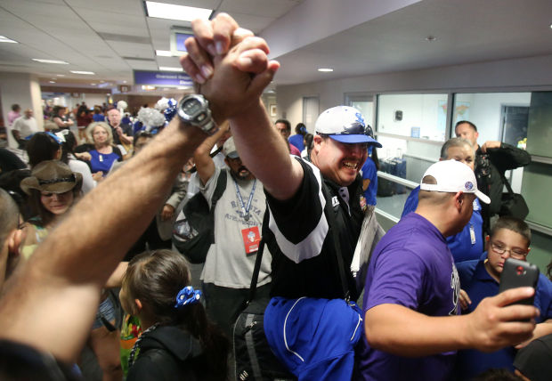 Sunnyside Little League softball team arrives home
