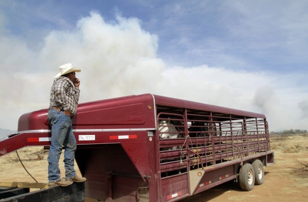 Grass fire burning near Empire Ranch