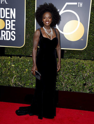 Black dresses dominate Golden Globes red carpet
