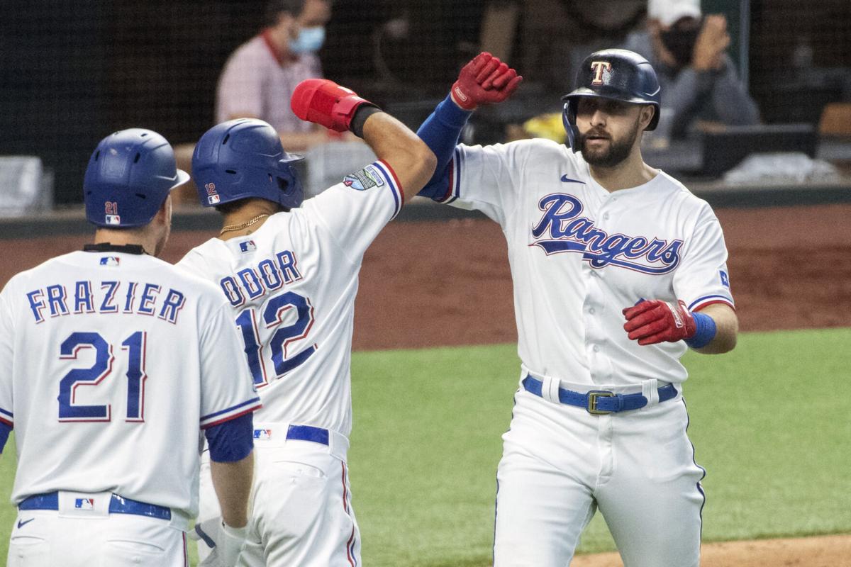 Texas Rangers' Joey Gallo, right, celebrates his two-run home run