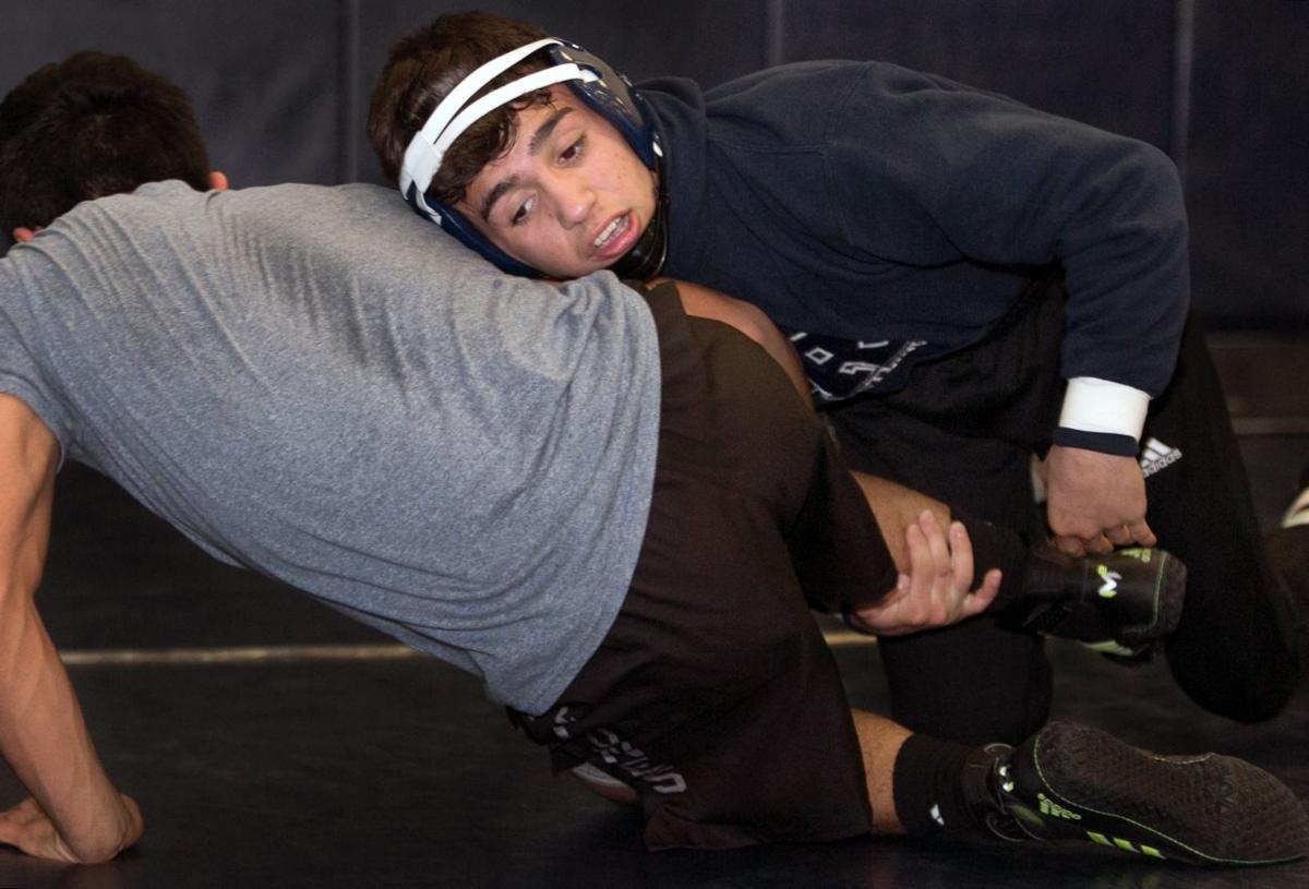 121315-spt-hs wrestling prev-p1