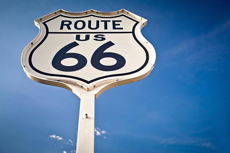 Route 66 sign on blue sky background