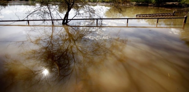 Water retention basin full on S. side; taxpayers benefit   