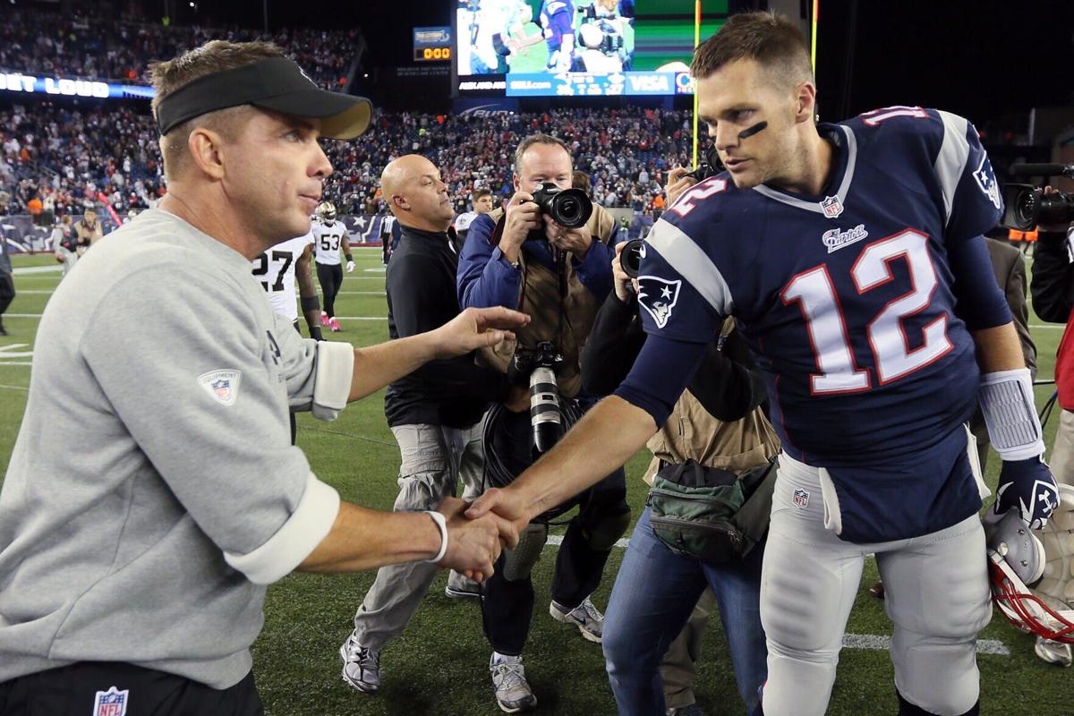 In this photo from October 13, 2013, head coach Sean Payton of the New Orleans Saints shakes hands with quarterback Tom Brady of the New England Patriots following the Patriots' 30-27 win at Gillette Stadium in Foxboro, Massachusetts.