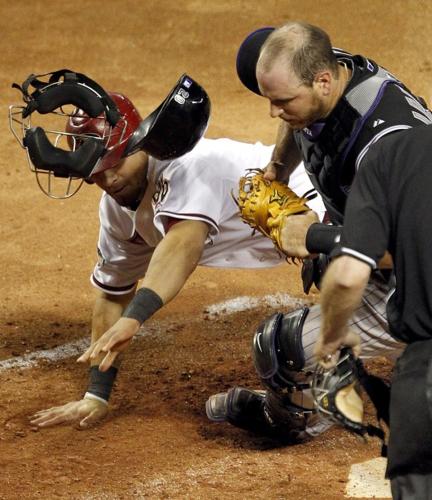 DIAMONDBACKS 5, ROCKIES 1: D-backs stretch lead   