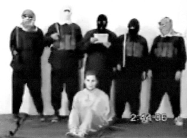 Militants in Iraq decapitate U.S. civilian, 26  