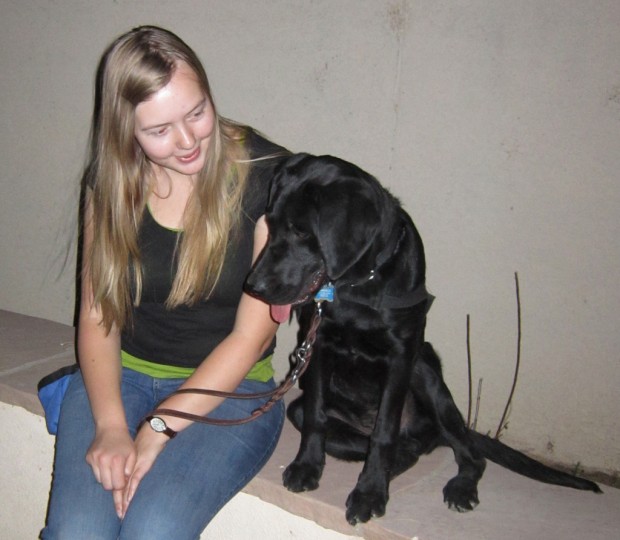 Senior to graduate with canine trainee at her side    