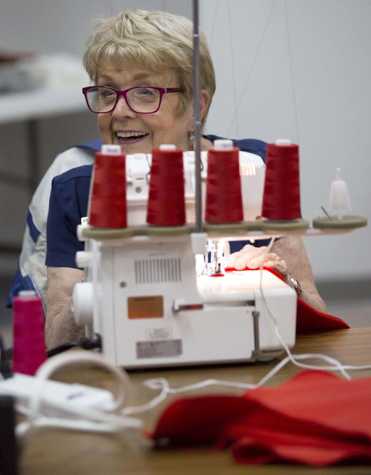 Sewing guild members help Tucson Medical Center dress babies for the