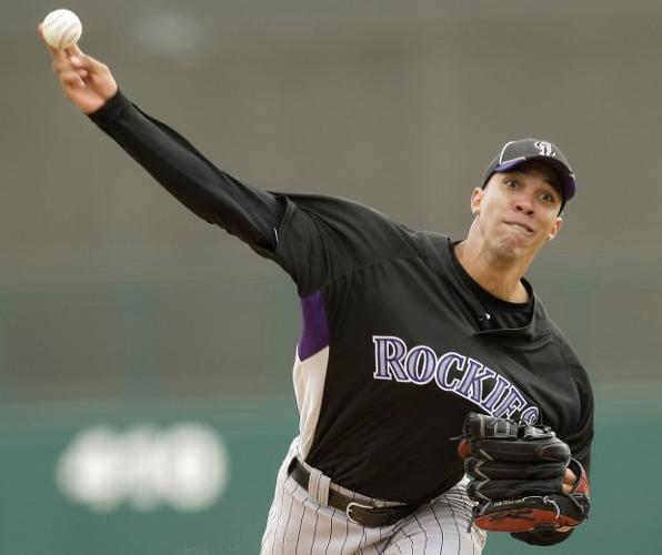Colorado Rockies starting pitcher Jeff Francis walks away from a