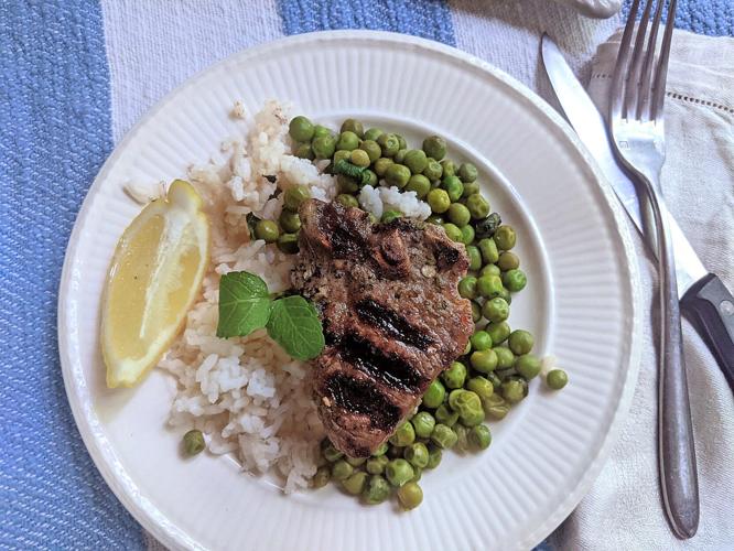 Lamb cooks quickly on the grill, and pairs well with a minty pea salad. ( Gretchen McKay/Pittsburgh Post-Gazette/ TNS.