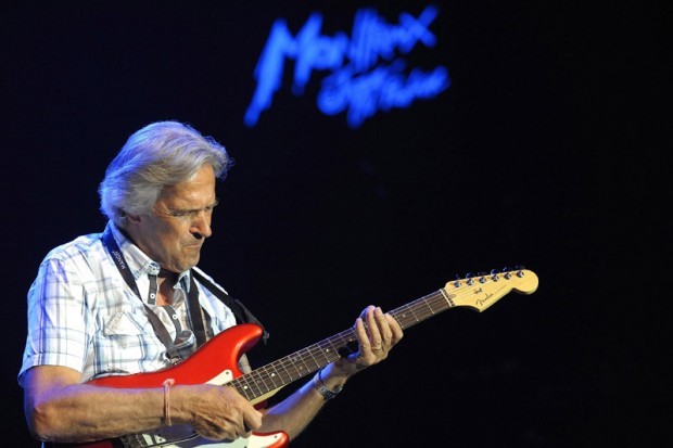 Nobody does fusion blends, fast guitar like McLaughlin 