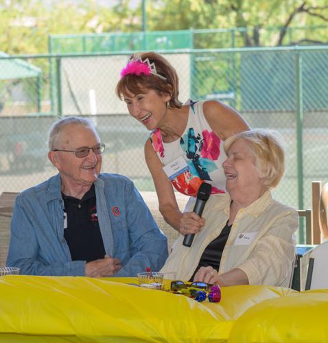 Ron-and-Kay-McNutt-laughing-with-volunteer-Sally-Teusch.jpg