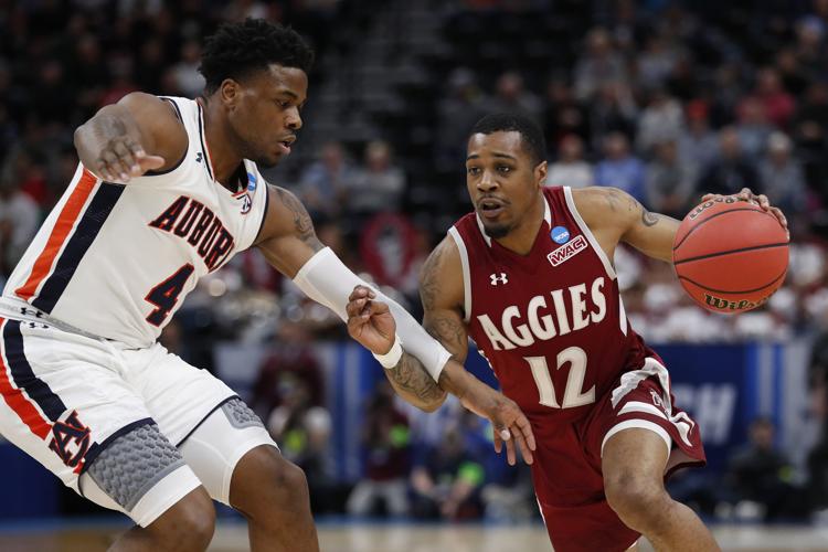 NNCAA New Mexico Auburn Basketball