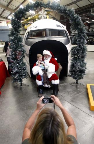 Santa lands at Pima air museum   