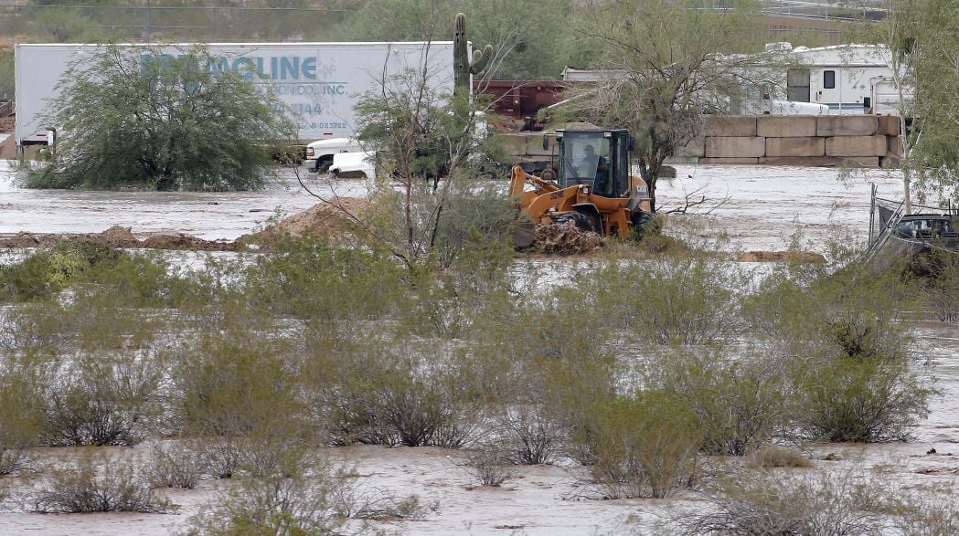 Photos: Floods in Phoenix close several major roads