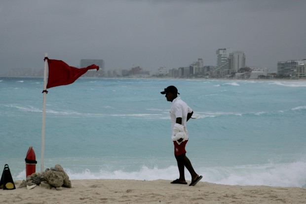 Tropical storm strikes Belize, is expected to enter Gulf today   