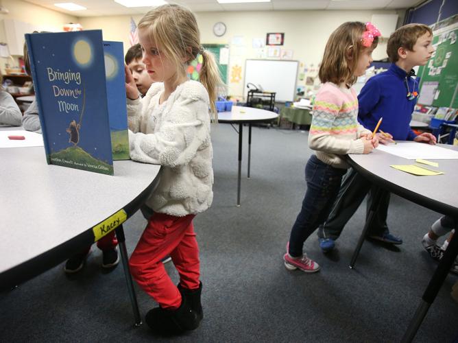 Kids use standing desks