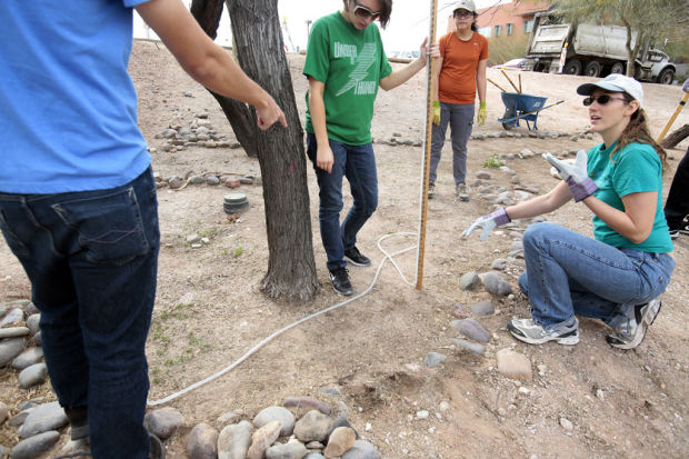 University of Arizona students installing new rainwater-harvesting systems    
