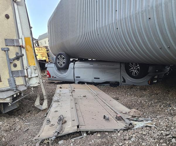 New vehicles, freight cars damaged in Arizona train derailment