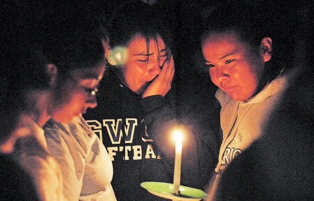 Roommate held in UA slaying  