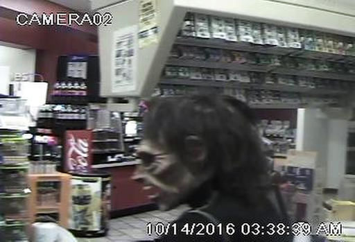 Halloween-masked robber with a hatchet robs Scottsdale store