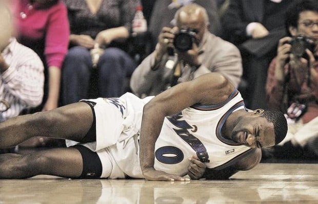 Arenas' knee injury occurs at a crucial time  
