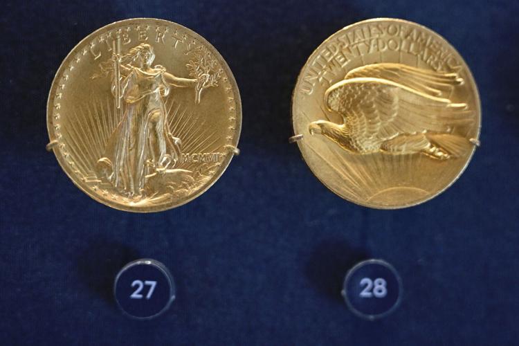 The front and back of a 1907 $20 gold piece, also known as a Saint- Gaudens Double Eagle, on display at the newly redesigned“ Money in Motion” exhibit at the Federal Reserve Bank of Philadelphia Thursday, May 7, 2026.