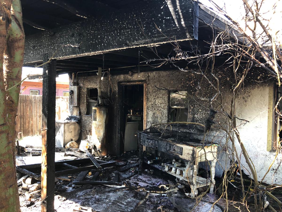 Cell phone user calls in Midtown house fire in Tucson