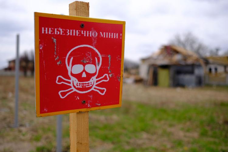 Russian forces left bombs, death and destruction around Kyiv. Now, a painstaking demining operation is underway