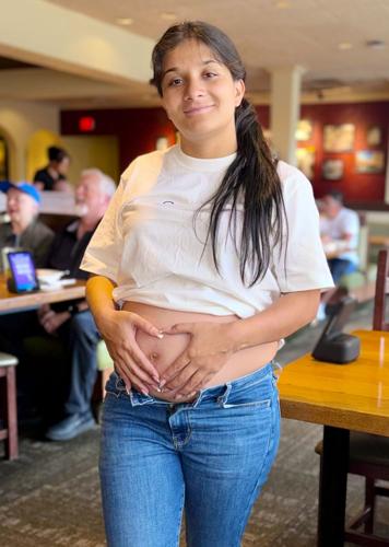 Lesli Vaca Diaz at restaurant