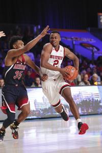 Defensive lapses cost second-ranked Wildcats in stunning loss to NC State