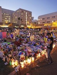 Shrines pop up across city in colorful displays of caring   