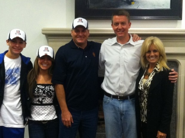 Rich Rodriguez and family with Greg Byrne